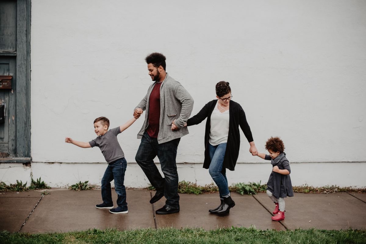 Couple holding hands, walking together